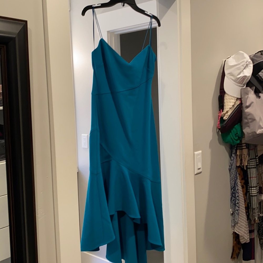 Likely asymmetrical dress. Bright turquoise. Size 2